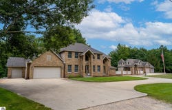 900 E Pine Grove Drive, Weidman, MI 48893