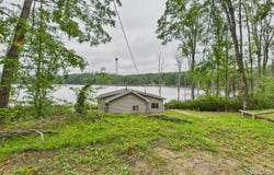 1677 W Martin Lake Road, Elmira, MI 49730