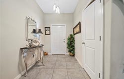 9736 PEMBROOKE PINES DRIVE, SUN CITY CENTER, FL 33573