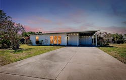 140 POINSETTIA CIRCLE NE, PORT CHARLOTTE, FL 33952