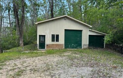 1677 W Martin Lake Road, Elmira, MI 49730