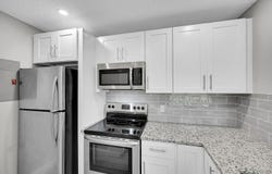719 Sunny Pine Way, Greenacres, FL 33415