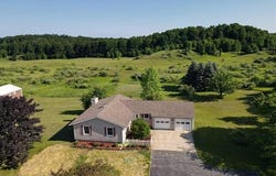 7632 BARNEY ROAD, LONG LAKE TWP, MI 49685