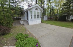 2757 Owens, Unit #163 Drive, Houghton Lake, MI 48629