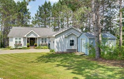 7070 APPOLLO LAKE LANE, TRAVERSE CITY, MI 49685-7052
