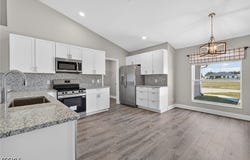 409 NE 25th Terrace, Cape Coral, FL 33909