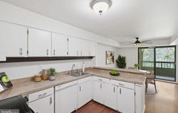5647 HARPERS FARM RD #F, COLUMBIA, MD 21044