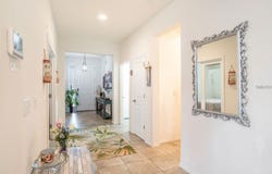 5144 FLOWING OAR ROAD, WIMAUMA, FL 33598