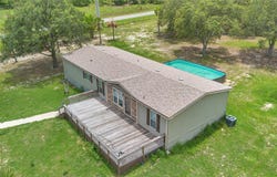 7565 DEWEY ROBBINS ROAD, HOWEY IN THE HILLS, FL 34737