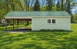 111 W FOREST HOME AVENUE, BELLAIRE, MI 49615