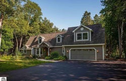 348 E SUGAR BAY LANE, CEDAR, MI 49621