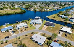 140 POINSETTIA CIRCLE NE, PORT CHARLOTTE, FL 33952
