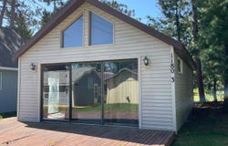 1180 W Higgins Lake Drive, Roscommon, MI 48653
