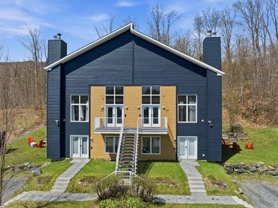 /international/ca/111-117-rue-de-la-grande-coulee-orford-quebec-110107890473/