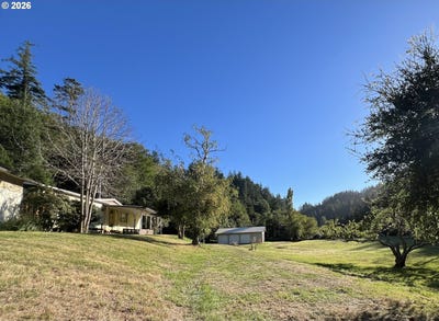 /international/us/32103-cedar-valley-rd-goldbeach-or-110120514864/