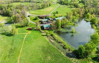 /international/us/8480-possum-hollow-road-nw-dundee-oh-110107843796/