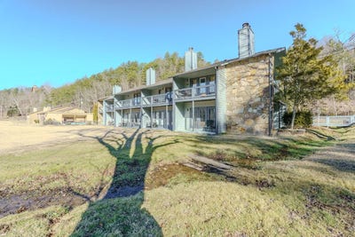 /international/us/4164-old-webb-creek-road-pittman-center-tn-110105269310/