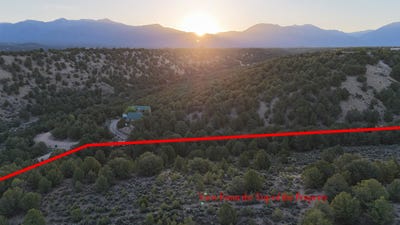 /international/us/2-sandia-canyon-rd-arroyo-hondo-nm-110099882172/