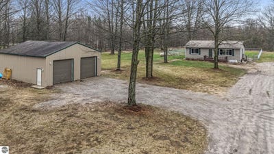/international/us/11337-riley-road-interlochen-mi-110107509368/