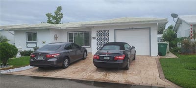 /international/us/8208-nw-57th-place-tamarac-fl-110106476466/