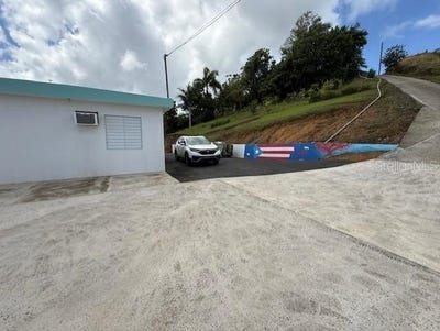 /international/us/calle-7-sector-jacana-bo-sumidero-aguas-buenas-pr-110101294920/?lang=fr