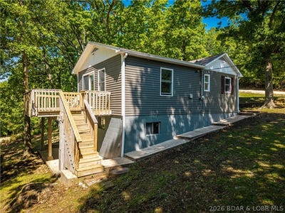/international/us/417-meadowbrook-drive-sunrise-beach-mo-110107907866/