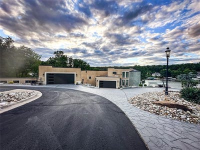 /international/us/149-thornwood-circle-sunrise-beach-mo-110099773450/