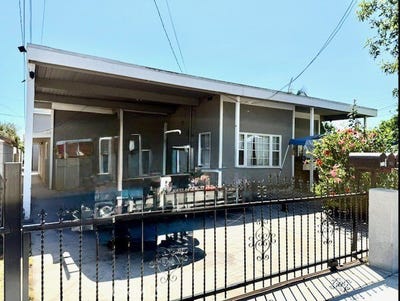 /international/us/8746-chester-street-paramount-ca-110102267641/