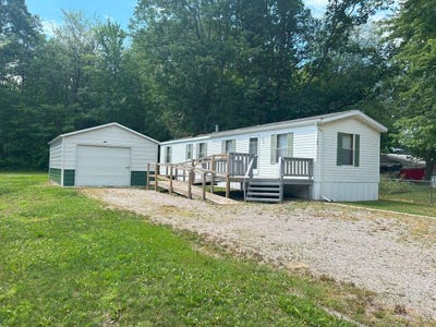 /international/us/126-westview-drive-houghton-lake-mi-110100809597/