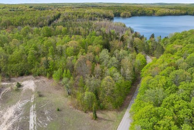 /international/us/lake-of-the-woods-road-lot-44-bellaire-mi-110108467758/