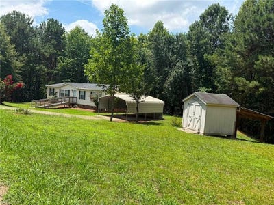 /international/us/1042-wells-creek-road-madison-nc-110109627007/