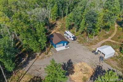 /international/us/4152-e-creek-wood-drive-chase-mi-110110376333/