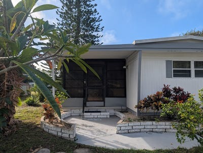 /international/us/74-lone-pine-avenue-dunedin-fl-110108417045/