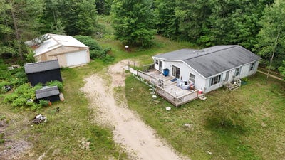 /international/us/14441-woods-trail-thompsonville-mi-110109747259/