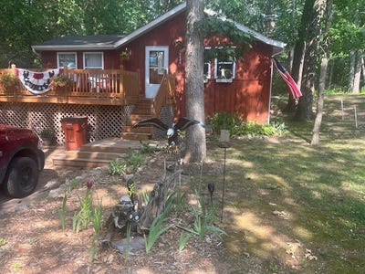 /international/us/16824-shawano-drive-ne-sand-lake-mi-110098492085/