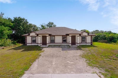 /international/us/709-711-harold-avenue-s-lehigh-acres-fl-110098564665/