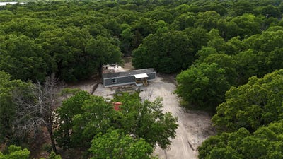 /international/us/9792-sunset-boulevard-quinlan-tx-110106784738/