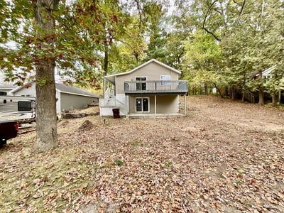 /international/us/16838-shawano-drive-ne-sand-lake-mi-110120583088/