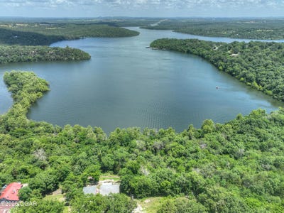 /international/us/lot-10-farm-road-1187-eagle-rock-mo-110100413689/
