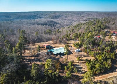 /international/us/8090-timberhill-road-hartshorn-mo-110105843749/
