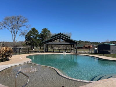 /international/us/7-wildwood-lake-drive-huntsville-tx-110106200741/