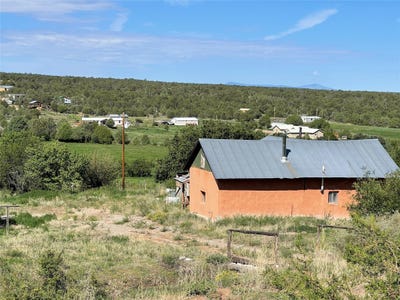 /international/us/107-county-road-69-ojo-sarco-nm-110086511249/?lang=en