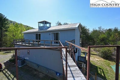 /international/us/2668-reedy-branch-road-purlear-nc-110098762392/
