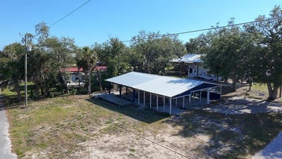 /international/us/122-e-5th-ave-horseshoe-beach-fl-110108364210/