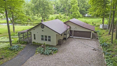/international/us/4482-woodland-drive-six-lakes-mi-110100396791/
