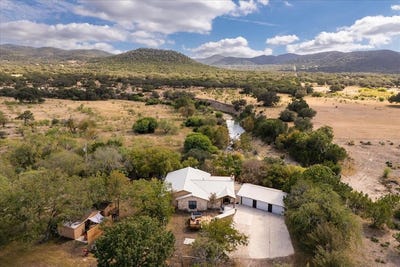 /international/us/15689-ranch-road-337-camp-wood-tx-110095423756/
