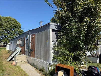 /international/us/829-zella-avenue-nw-new-philadelphia-oh-110120508215/