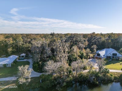 /international/us/2750-pearl-lake-trail-new-smyrna-beach-fl-110104819559/