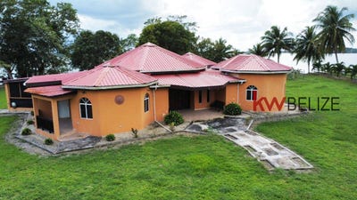 /international/bz/stunning-property-with-2000-feet-lake-frontage-orange-walk-town-orange-walk-district-310104832300/