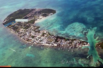 /international/bz/avenida-mangle-caye-caulker-island-belize-city-310106607724/
